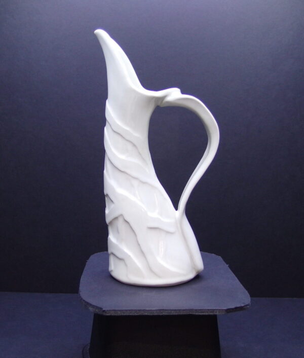 Joeleen creates pottery pitcher